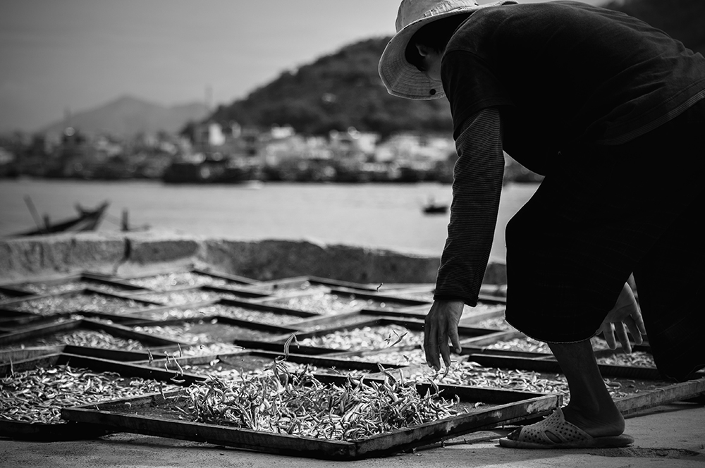 14. Drying fish by Au Eightx / Picfair
