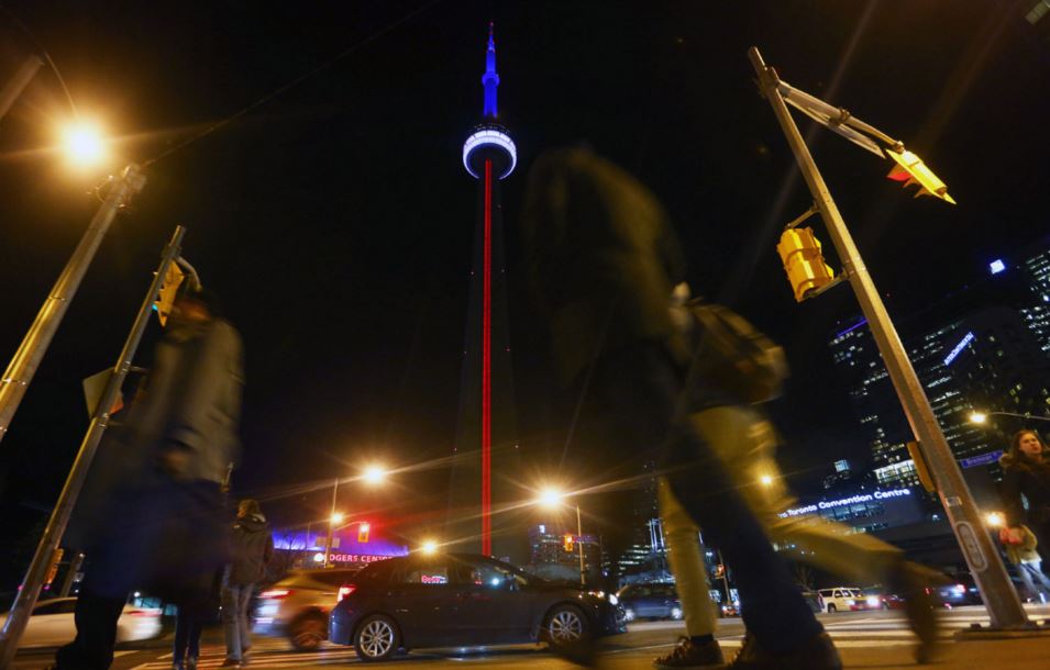 cn-tower-toronto-sign-wear-red-white-and-blue-for-paris