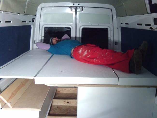 The bed folds up and down on hinges so it can easily be stashed away during the day.