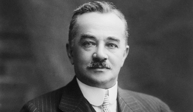 This guy is Milton Hershey, of Hershey's Chocolate, he had tickets to board the Titanic that day, but cancelled due to another business meeting - In a way, his chocolates saved him