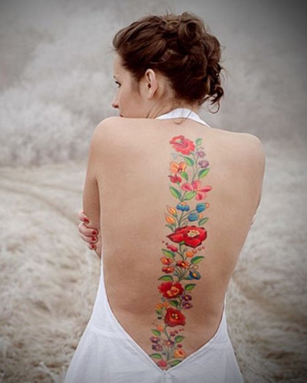 Have a garden of beautiful flowers on your back. Each flower could have a different meaning and all these could also represent who you are as a person.