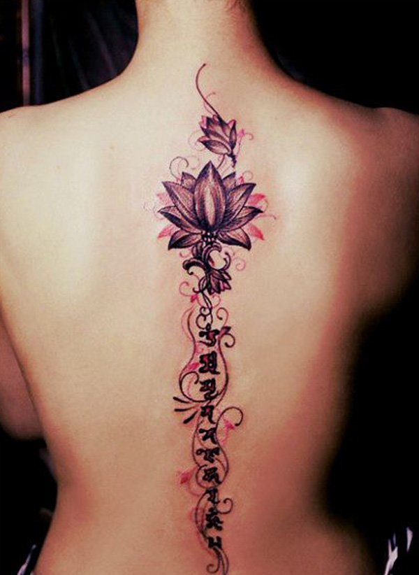 Go with softer and feminine colors to complement your design. This is another lotus flower spine tattoo and besides the color of the flower, pink shadows give more life to the design.