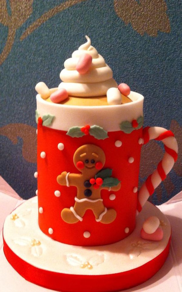 Beautiful mug themed Christmas cake. The design on the mug is also inspired by the gingerbread man who is also a popular figure during Christmas season.